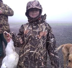 Little Boy with Duck